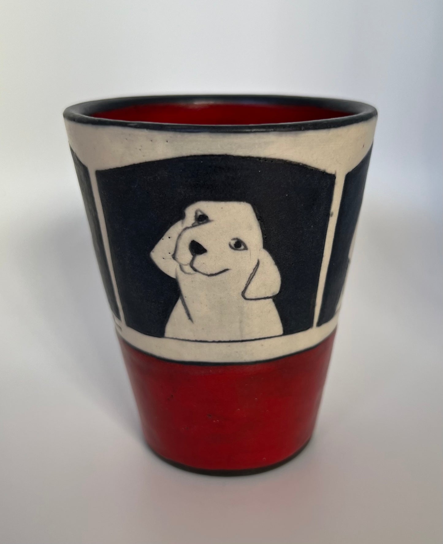 Dogs on Juice cup 3.5"x3" by Sally Jaffee