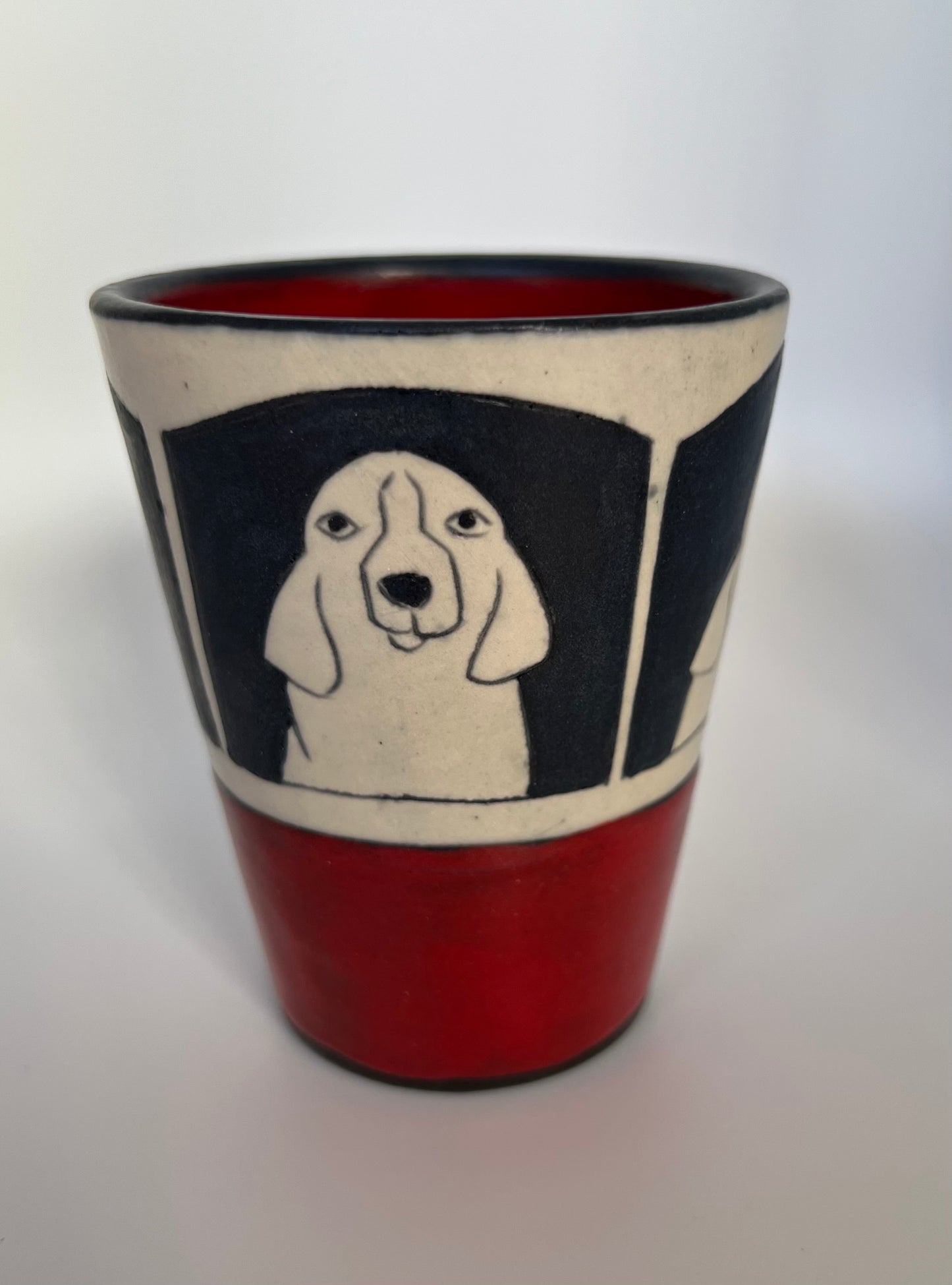 Dogs on Juice cup 3.5"x3" by Sally Jaffee