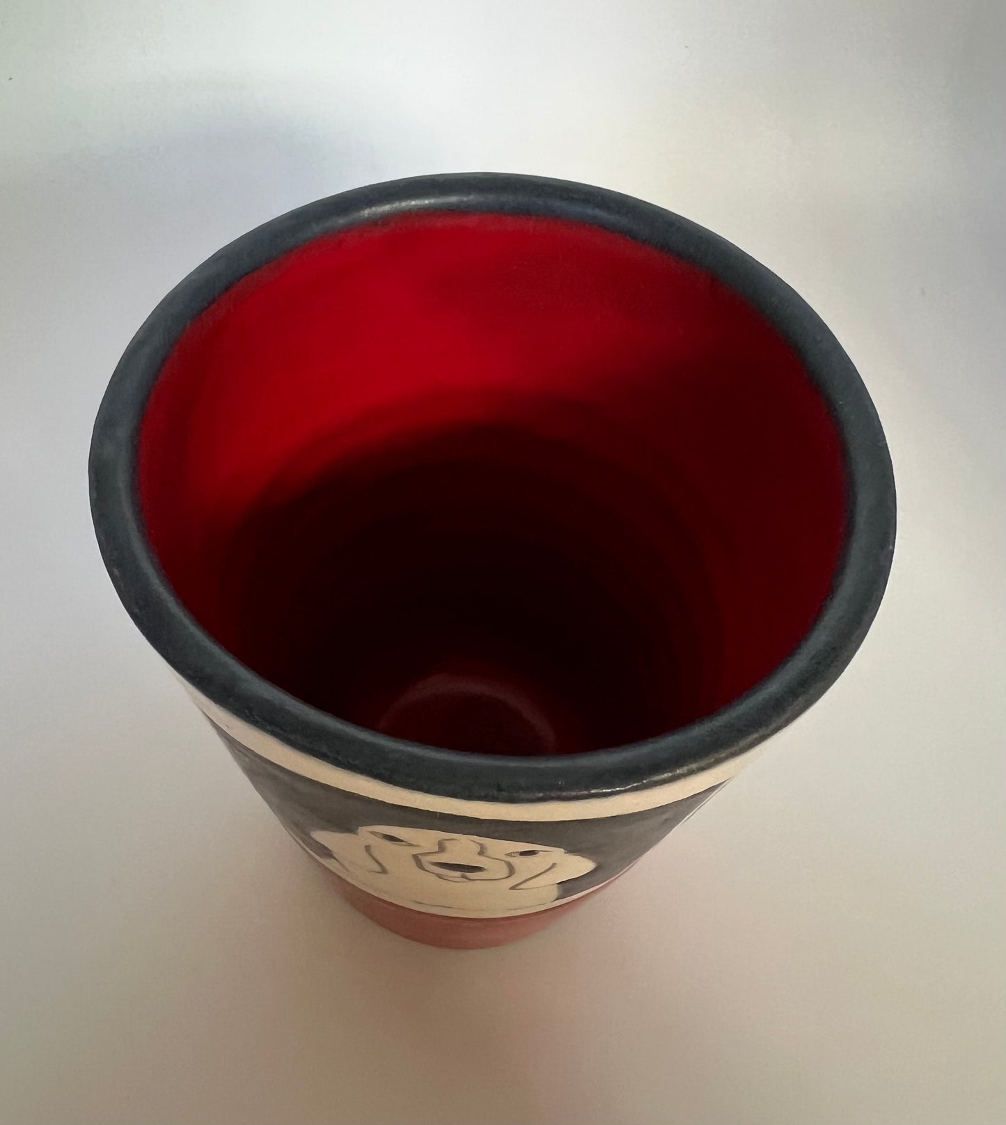 Dogs on Juice cup 3.5"x3" by Sally Jaffee