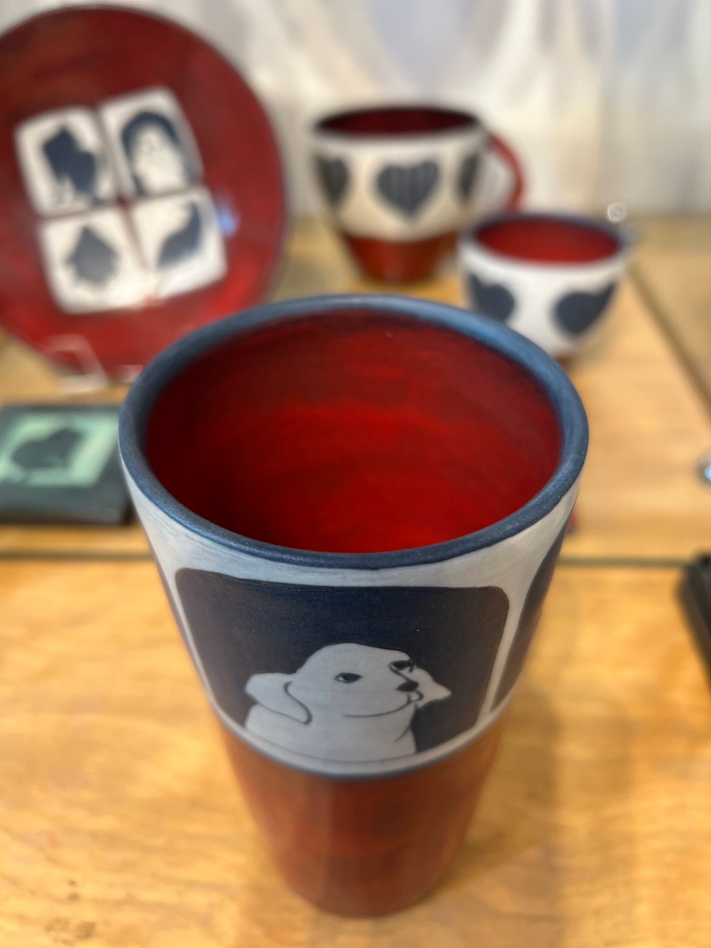 Dogs on Tumbler 6” by Sally Jaffee