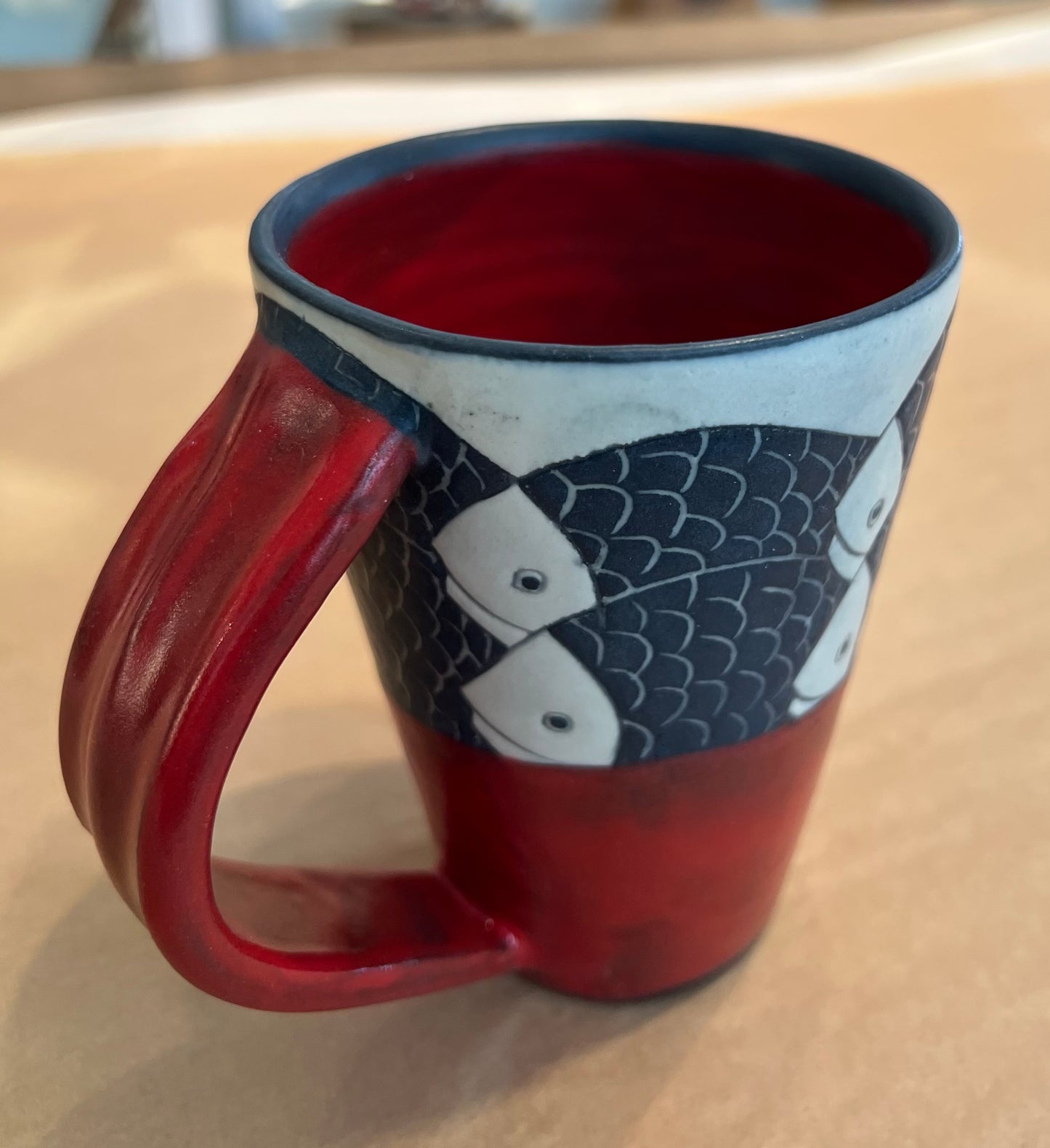 Fish on Coffee Cup 4-1/2”x3” by Sally Jaffee