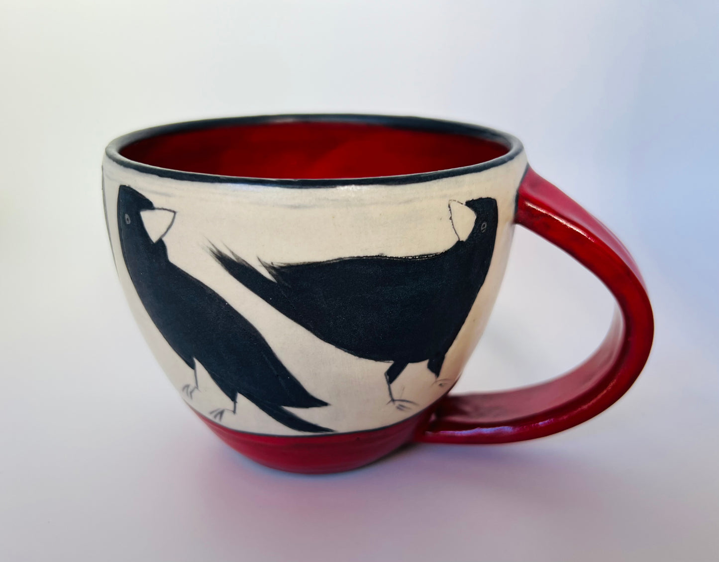 Crow on Latte cup by Sally Jaffee