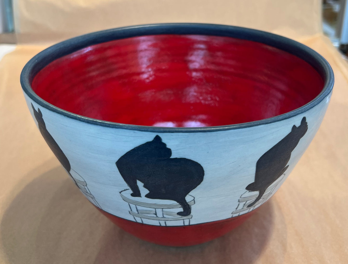 Cats on Bowl 5”x8” by Sally Jaffee
