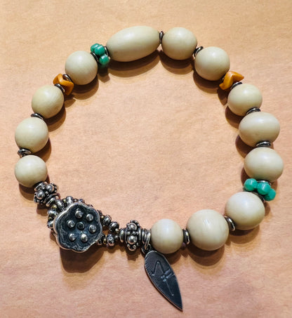 #2555 NT bracelet sterling lotus button, Bone, African Glass